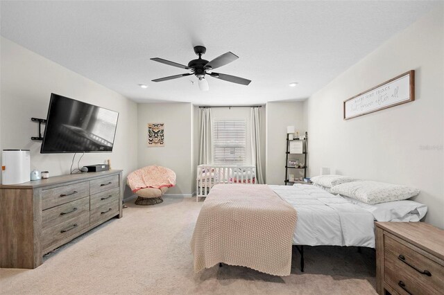 1820 Holden Ridge Ln, Clermont, FL 34715 - carpeted bedroom with baseboards and a ceiling fan