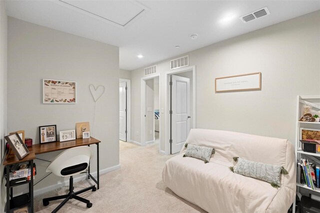 bedroom featuring light colored carpet