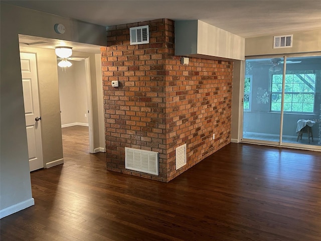 empty room with dark wood-type flooring