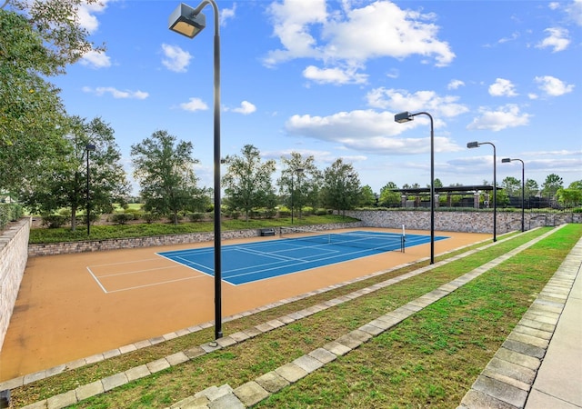 view of basketball court with tennis court