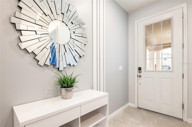 mudroom featuring light tile patterned floors