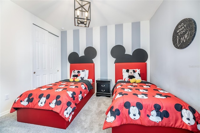 bedroom with a closet and carpet floors