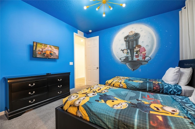 carpeted bedroom featuring a textured ceiling