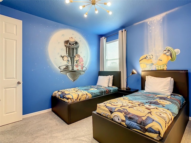 bedroom featuring light carpet and a chandelier