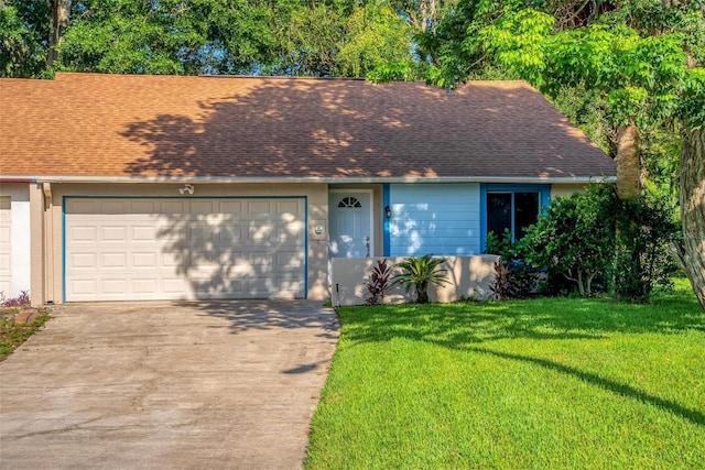 108 Clear Lake Cir, Sanford, FL 32773 - view of front facade with a garage, concrete driveway, a front yard, roof with shingles, and stucco siding