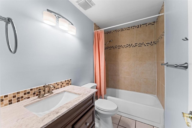 full bathroom with backsplash, tile patterned floors, toilet, shower / tub combo with curtain, and vanity