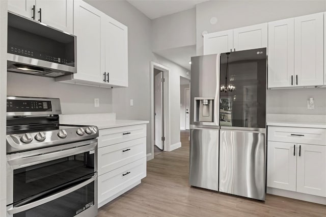 kitchen featuring white cabinets and stainless steel appliances