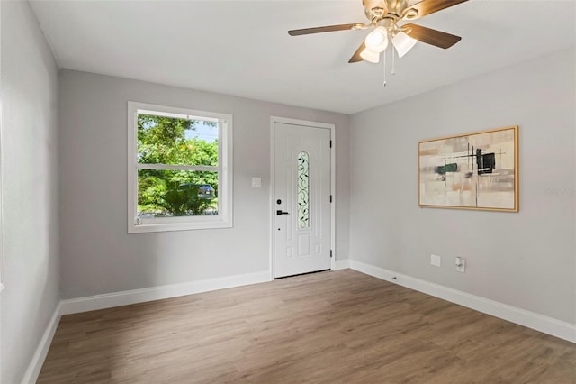 entrance foyer featuring hardwood / wood-style floors and ceiling fan