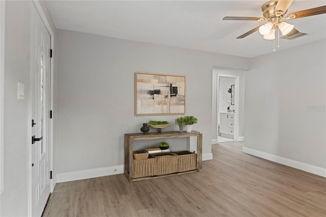 corridor featuring light hardwood / wood-style flooring