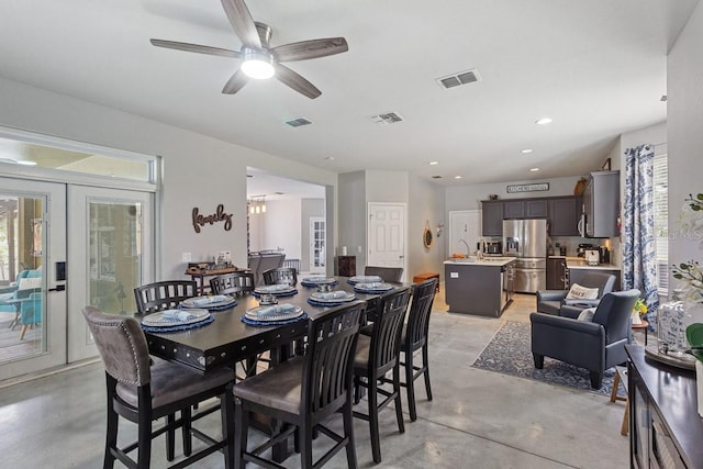 dining space featuring ceiling fan