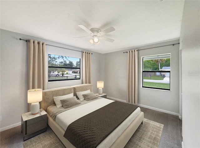 bedroom featuring ceiling fan and wood-type flooring