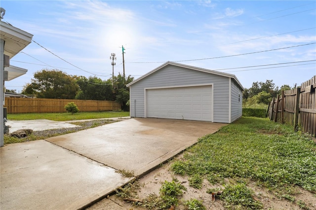 garage with a yard