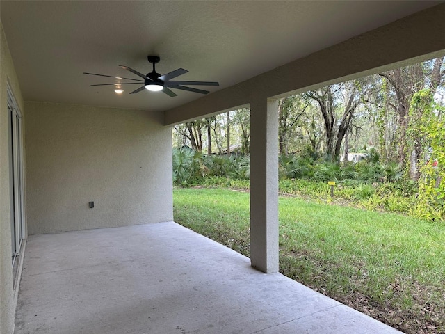 view of patio featuring ceiling fan