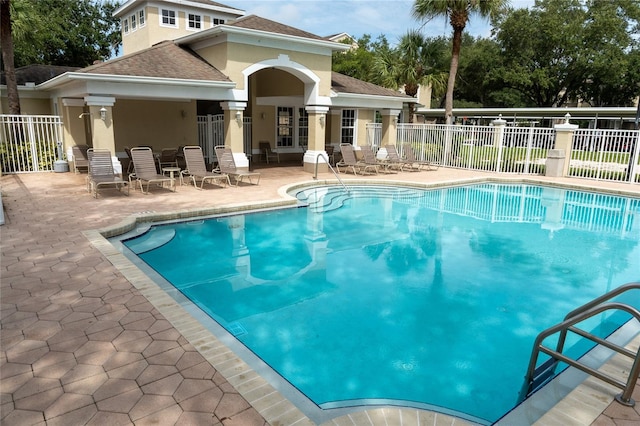 view of swimming pool featuring a patio