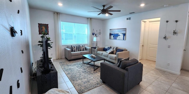 tiled living room featuring ceiling fan