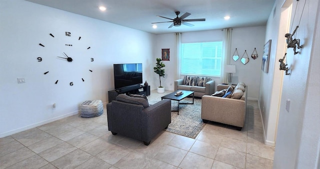 tiled living room featuring ceiling fan