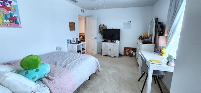 bedroom with light carpet