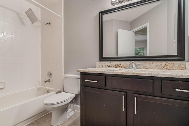 full bathroom with tiled shower / bath, vanity, toilet, and tile patterned flooring