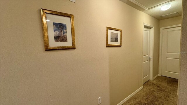 3167 Tocoa Cir, Kissimmee, FL 34746 - hallway featuring baseboards and carpet floors