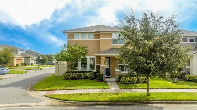 view of front of property with a front lawn