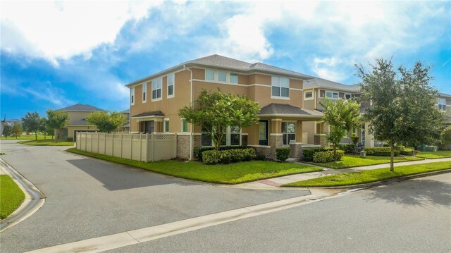 view of front of house with a front lawn