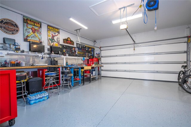 garage with a workshop area