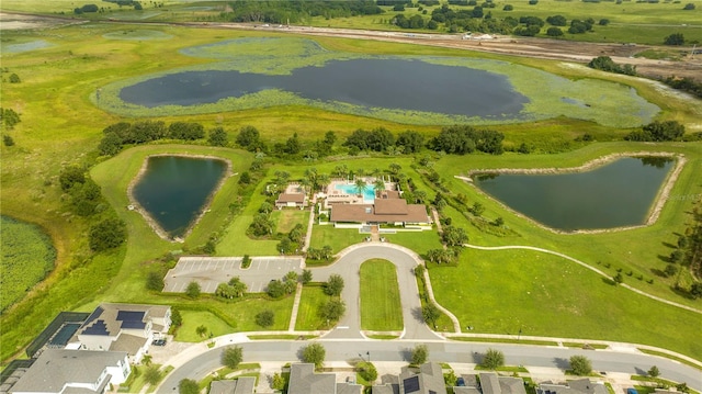 drone / aerial view with a water view