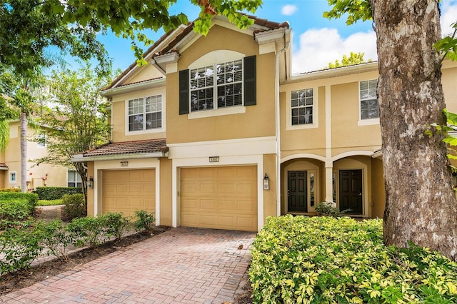 view of front of property with a garage