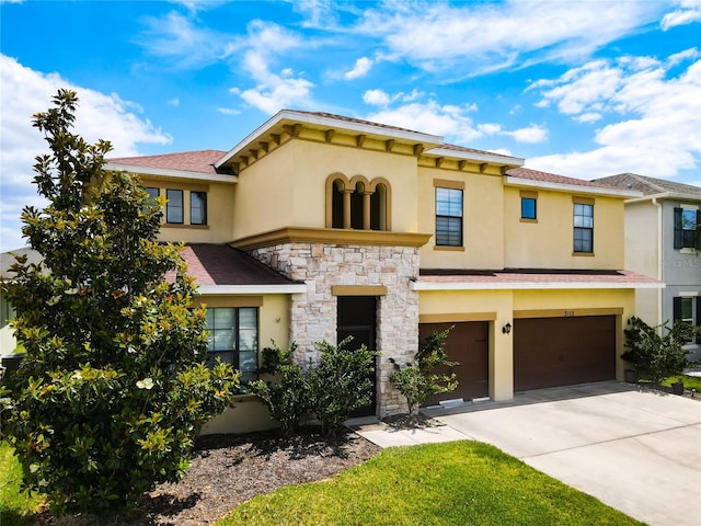 view of front of property featuring a garage