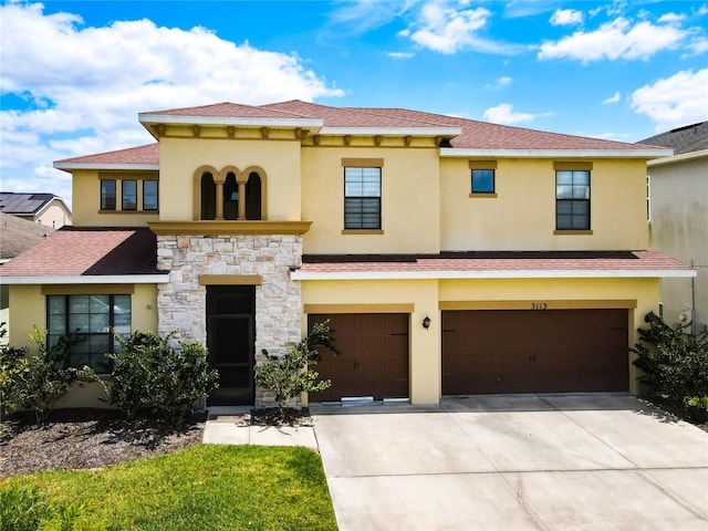 view of front of house with a garage