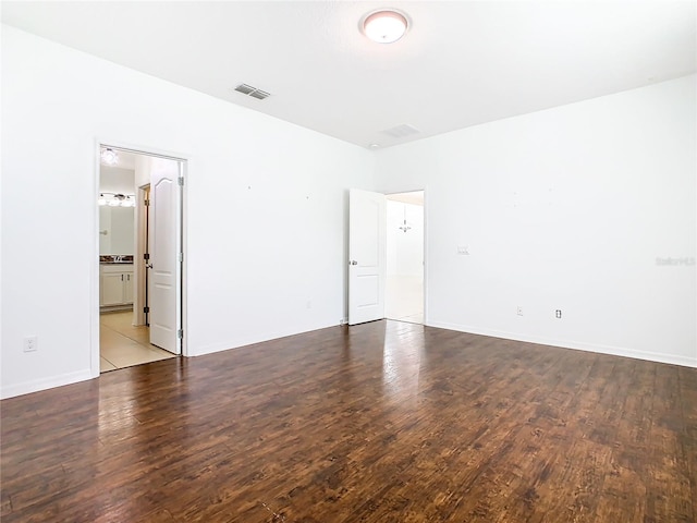 unfurnished room with light hardwood / wood-style flooring