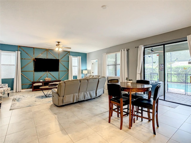 dining room featuring ceiling fan