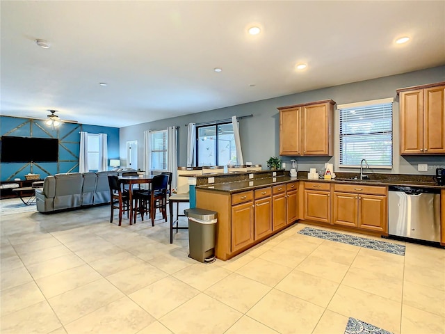 1471 Rolling Fairway Dr, Davenport, FL 33896 - kitchen with a peninsula, open floor plan, ceiling fan, stainless steel dishwasher, and a sink
