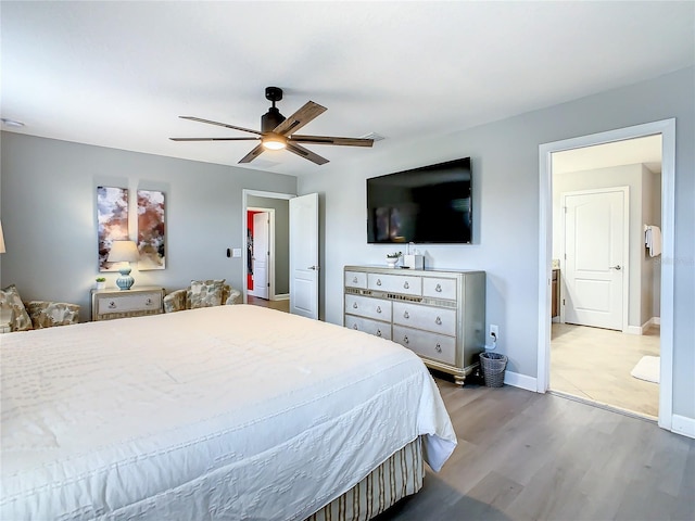 bedroom with wood-type flooring and ceiling fan