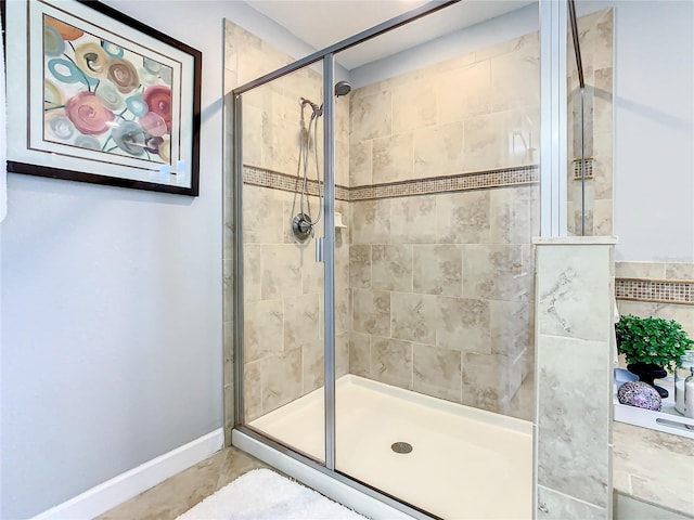 bathroom featuring an enclosed shower