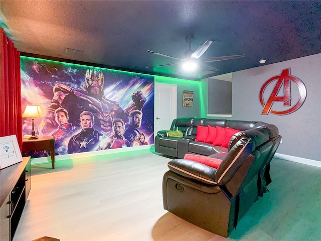 1471 Rolling Fairway Dr, Davenport, FL 33896 - cinema room with baseboards, a textured ceiling, and a ceiling fan