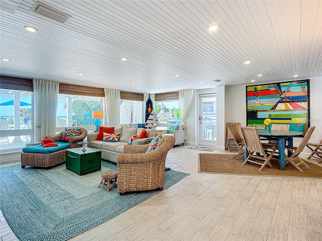 living room featuring wood ceiling and light wood-type flooring