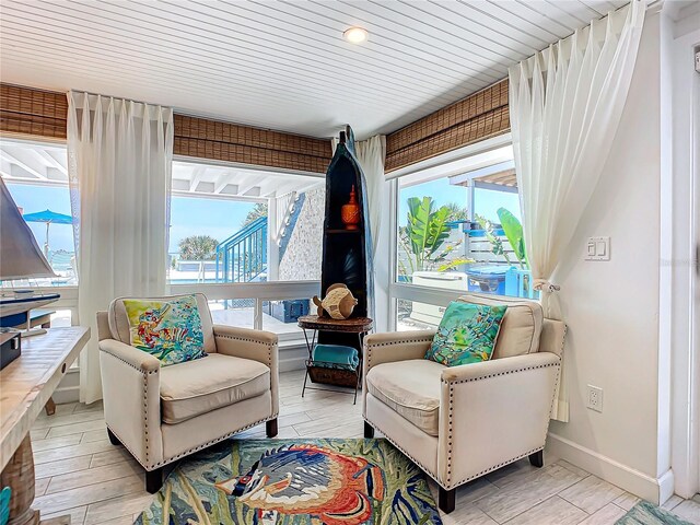 living area with light hardwood / wood-style flooring