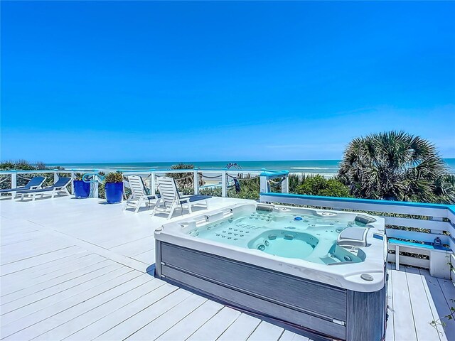 wooden terrace with a water view