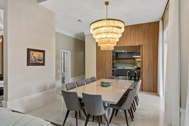 dining room with an inviting chandelier and crown molding