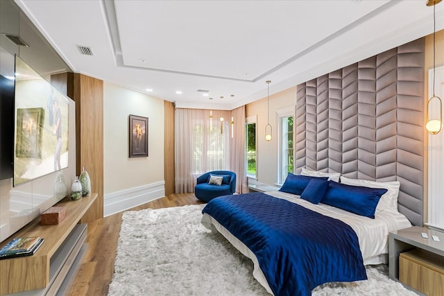 bedroom featuring light hardwood / wood-style flooring