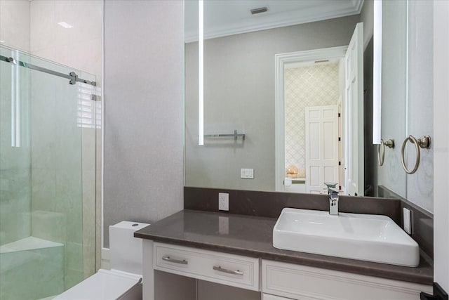 bathroom featuring walk in shower, toilet, crown molding, and vanity