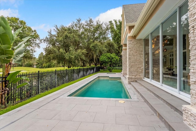 view of pool with a patio