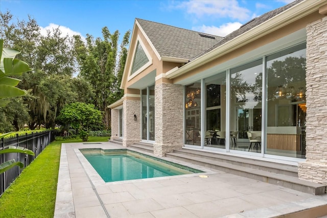 view of pool featuring a patio area