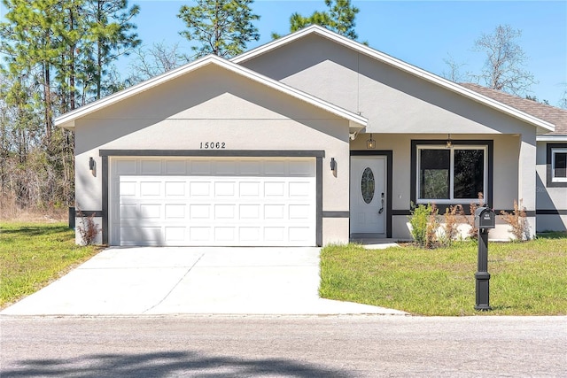 ranch-style home with a garage, driveway, a front lawn, and stucco siding