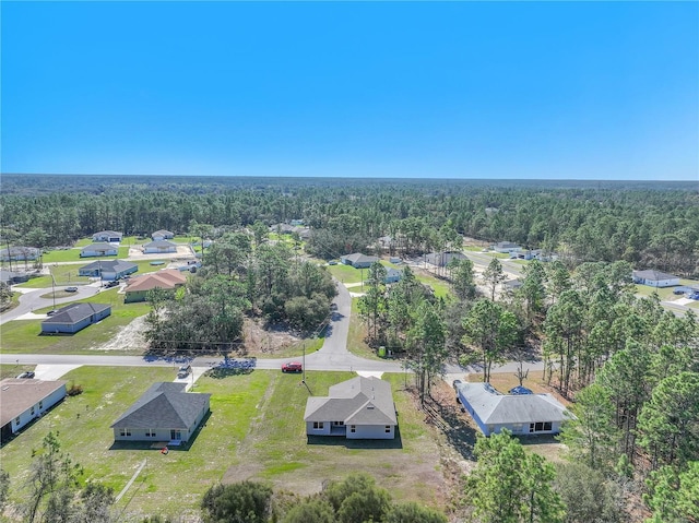 drone / aerial view with a forest view