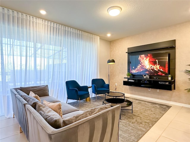 interior space with tile patterned floors, recessed lighting, and baseboards