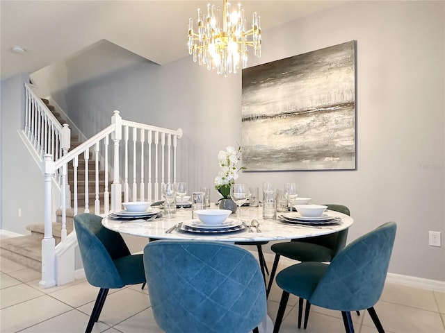 tiled dining area with an inviting chandelier