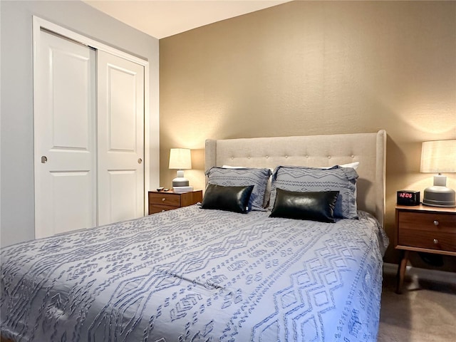 carpeted bedroom with a closet