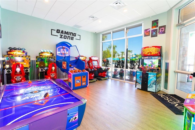 game room with hardwood / wood-style flooring